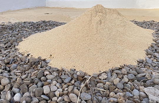 Ajout de sable sur gravier / Préparation de sol